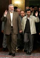 7 Ismail Haniya and Mahmoud Ahmadinejad walking hand in hand (IRNA, December 10) At a reception for Ismail Haniya, Mahmoud Ahmadinejad said that the Palestinian government has to support the
