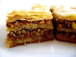 Cheese stuffed phyllo triangle Baklava: layers of phyllo filled with chopped nuts and