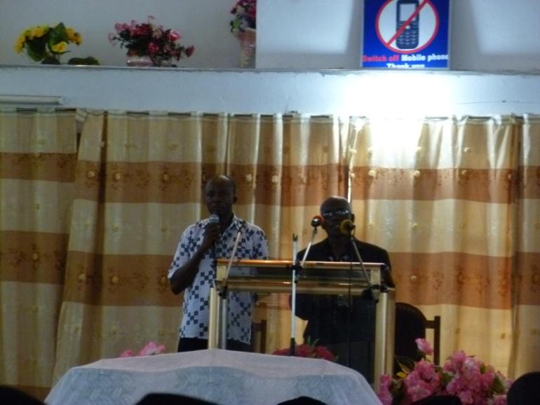 at the funeral. In this picture, brother Adjei Mensah is speaking on our behalf.