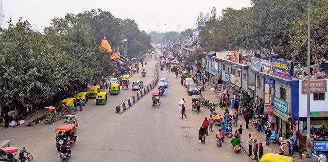 Delhi is a complex maze of small streets crowded with small shops, while New Delhi has wide streets and modern shopping centers. More than twenty million people live in Delhi and New Delhi combined.