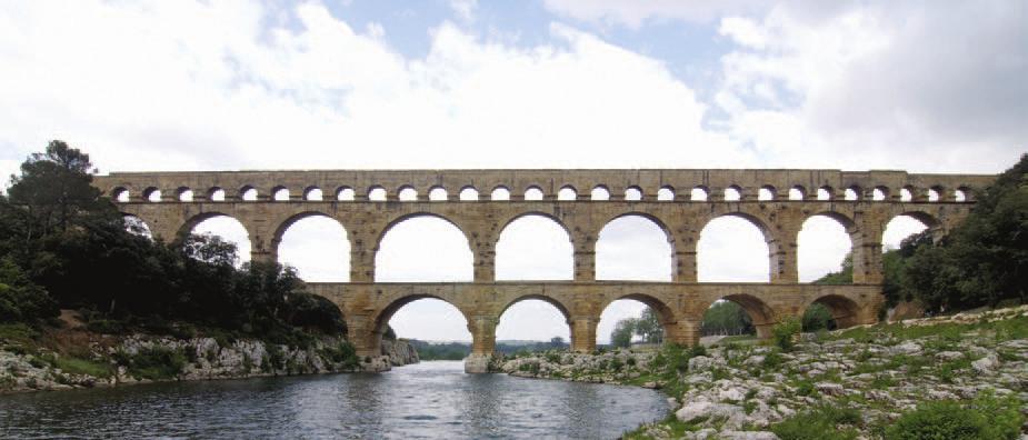 4.28 Pont du Gard, ca. 16 CE. Near Nîmes (ancient Nemausus), France. Stone block, 902' long 161' (275 49 m) high; each large arch spans 82' (25 m).