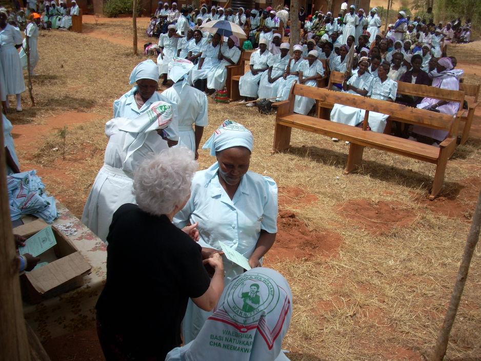 Following the graduation, we presented 240 bags of maize, one to each widow present at the meeting and sent a bag to those who couldn t attend.