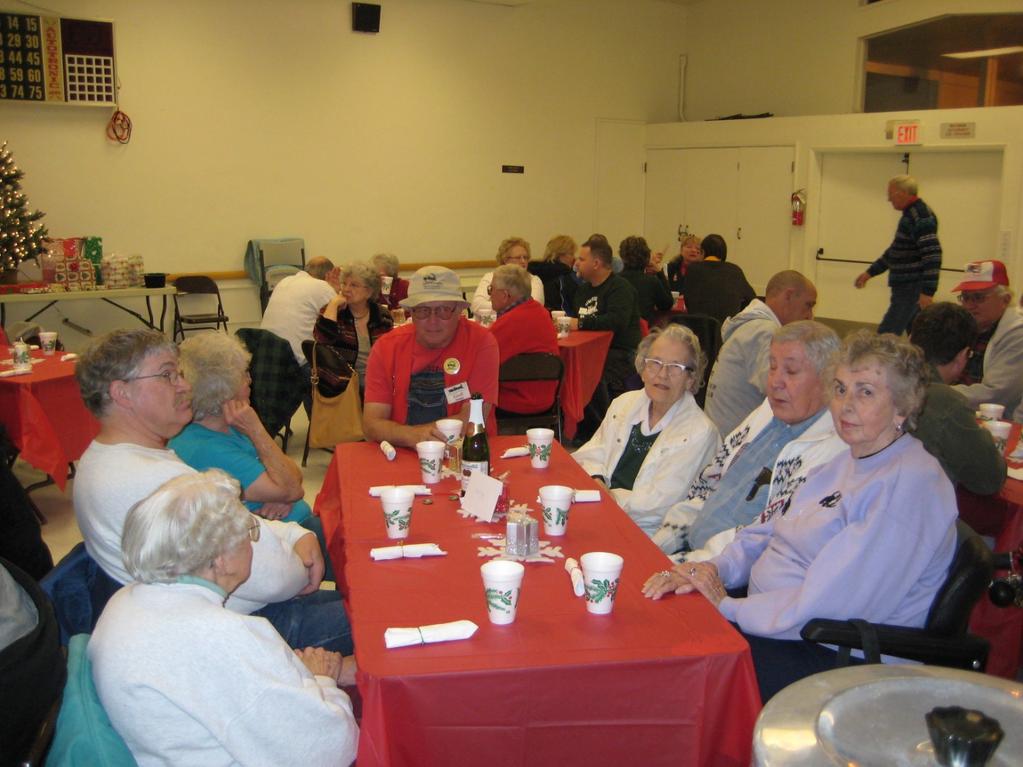 The picture at left depicts Kathleen and Robert in the lower right attending the December 2007 TLRC Christmas dinner at the Veterans Hall. Kathleen preceded Robert in passing.