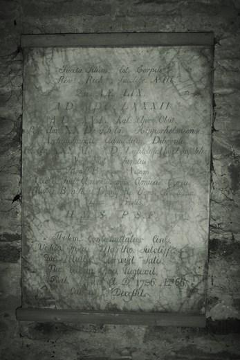 Artefacts from the Old Church A memorial tablet for Rev Rich Sutcliffe and his wife, Martha.