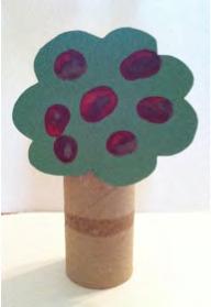 Step 3. Give each student a bathroom tissue roller and guide them in carefully gluing their tree tops to the front of the roller.
