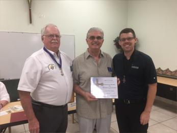 May 2018 Page 7 Grand Knight Haas and Fr. Matt Grady presenting Brother Al Ferrigno his Formation Degree Certificate.