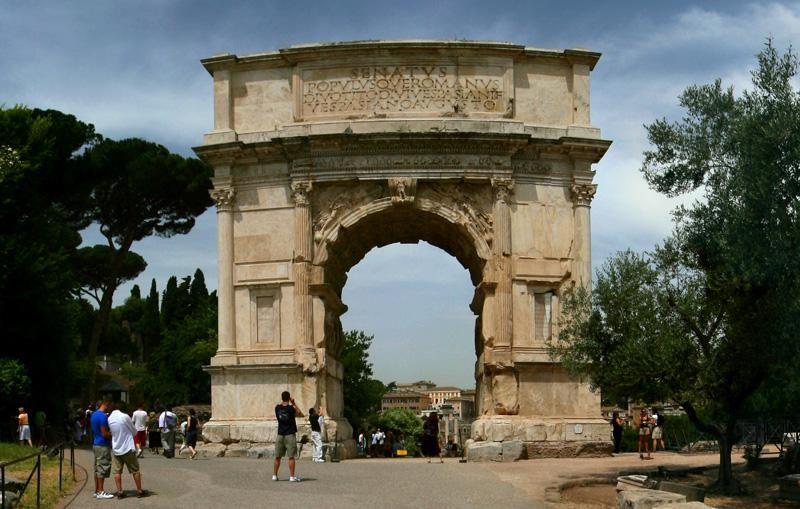 Early Empire Arch of Titus, Rome 81 CE Domitian erected a massive arch for his brother Titus who ruled rome for two years died 81 CE Triumphal arch has long history in Roman art and architecture