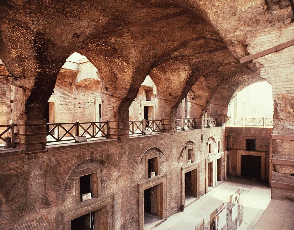 High Empire Markets of Trajan, 100-112 CE Markets housed shops and administration offices Concrete made the massive multi tiers complex possible Apollodorus of Damascus is possibly the most famous of