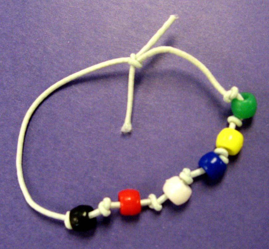 A TINY BIT-O-TALENT Grade 3 Grade 6 Lesson #3-Ruth Reminder Wristband Materials Stretchy cord any color 11-12 inches long Assortment of pony beads (yellow, black, red, white, blue, green) Masking