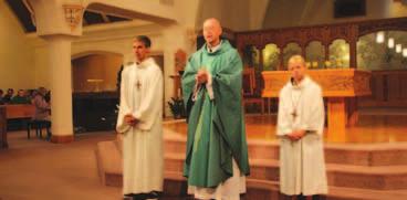 St. Patrick s Catholic Church Altar Servers Trained in New Procedures Matthew Ferguson and Kinsey Skillstad assist Fr.