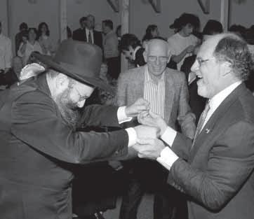 The 770 replica at Rutgers. After the expansion, the size will triple. Rabbi Carlebach dancing with mekuravim and supporters of the Chabad house. they should write to the Rebbe.