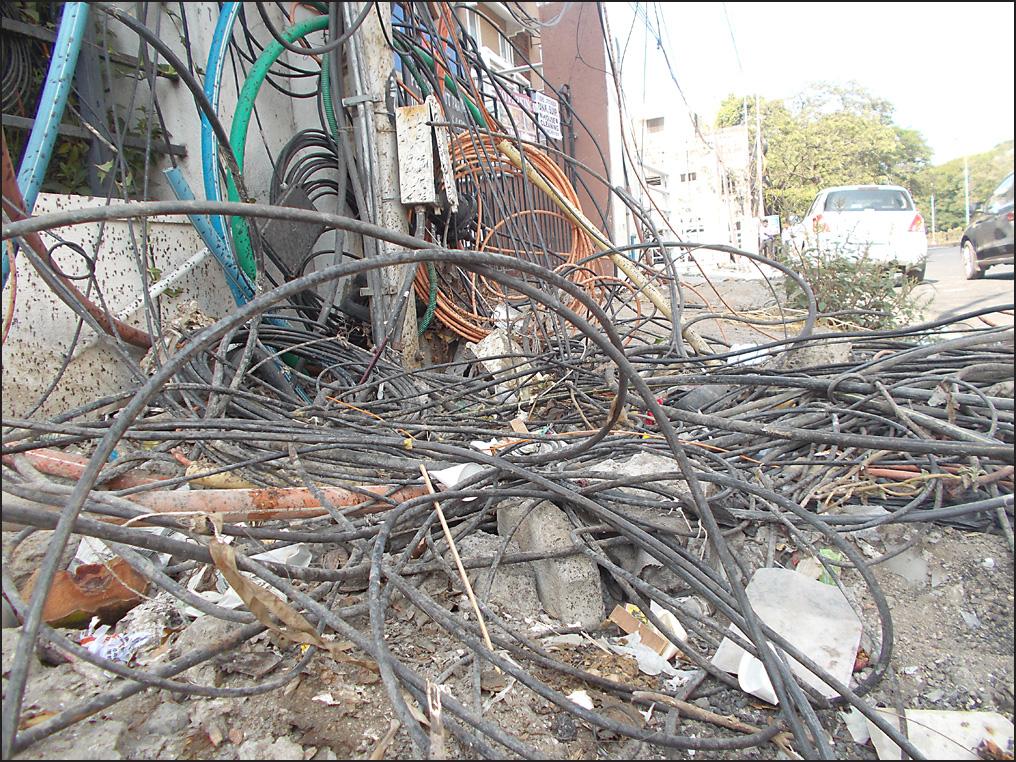 Arihant Complex, G. N. Chetty Road, T. Nagar for several months. An unwary pedestrian can trip and fall as the cables are not visible at night.
