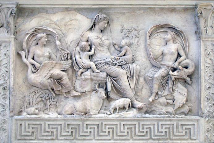 There are seated barbarians with their hands tied behind their backs and a woman being dragged by her hair. This is Roman victory, the defeat of their enemies.