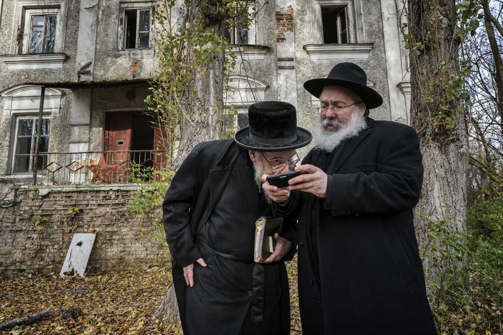 Yitz Twersky in front of the former synagogue, while