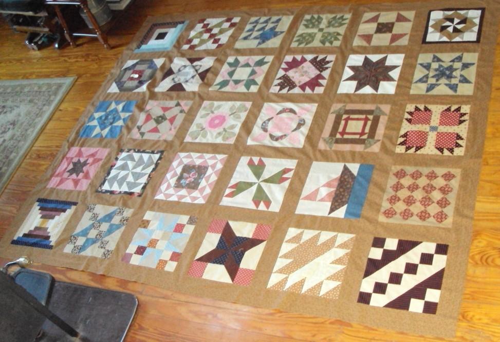 Win this Quilt! Members of the Highland County Quilters Guild made this beautiful sampler quilt using Civil War era patterns and reproduction fabrics.