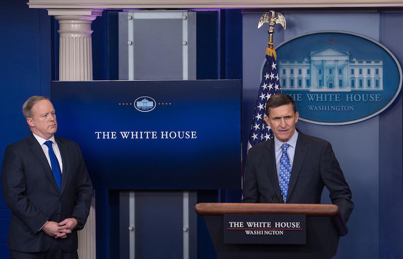 U.S. National Security Adviser Michael Flynn speaks during the daily press briefing as Press Secretary Sean Spicer (L) looks on at the White House in Washington, on Feb. 1, 2017.