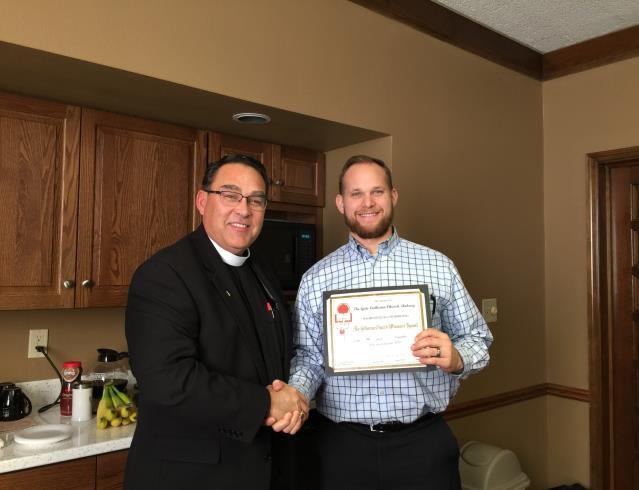THANK YOU! President Turner of IDW congratulated Pastor Aaron Hannemann after the Board of Directors (at their November meeting) received The Gate Lutheran Church, Ankeny as a member of the LCMS.