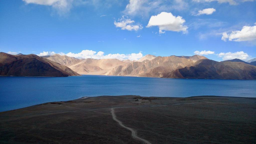DAY 7: 9 TH AUGUST LEH TO PANGONG LAKE DISTANCE: 156 KMS (6 HRS) Key Highlights Today we set off on a journey to the iconic Pangong Tso.