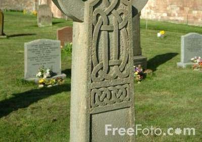 Patrick (perhaps) drew a cross over a standing druid monument with a circle at the top incorporating their