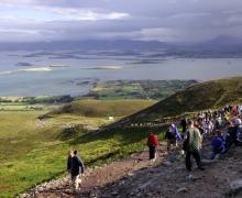 Pilgrims climb to the top of Croagh Patrick on the
