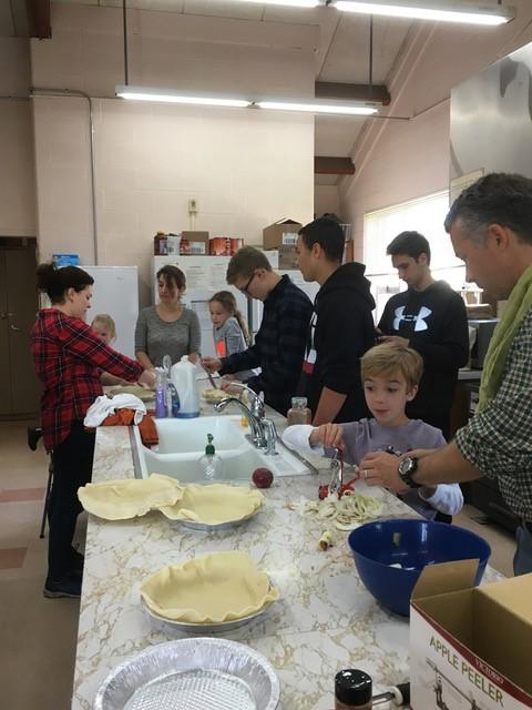 doughnuts!), the youth and their parents returned to church to prepare and assemble 40 pies.