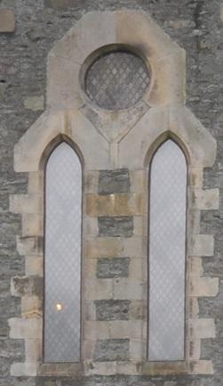 Figure 9: Single light lancet widow: (Nave, North Transept, Chancel and Vestry) Thirteenth century style plate tracery in the north transept wall comprising two light tall bald lancet