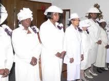 All members of Mothers-in-Zion are asked to sit together in honor of Mother Geneva Smedley.