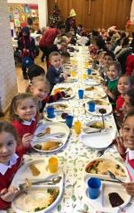 With Christmas parties and swimming last week, the whole school sat down to enjoy their Christmas dinner together on Tuesday 19th December.