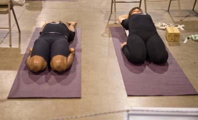 vinyasana, one practitioner demonstrated classic practice, while the other demonstrated