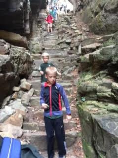 The older boys descended into the gorge.