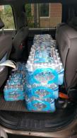 Two vehicles, loaded to capacity, carried almost 3000 bottles of water that were donated by parishioners.