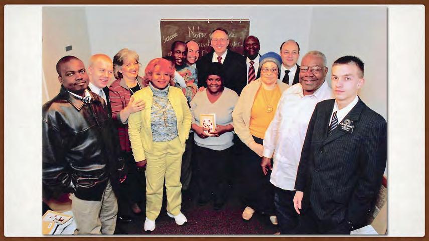 Norman (just right of center) with members of his ward, 19 December 2008 Four months later he was called as branch president for a small inner-city group of about 24 members.