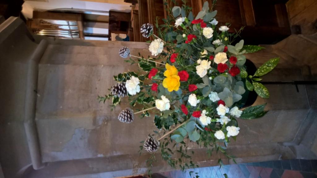 decorate the church with flowers, fabrics and other materials.