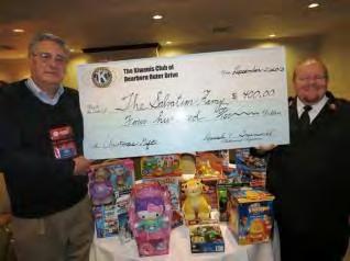 Not only did we pass along a big check, but all the members brought in brand new age-specific toys for them to