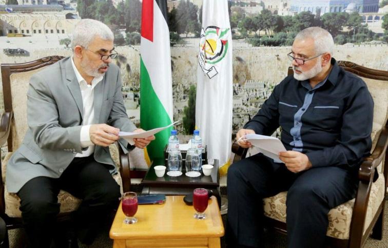 10 [Picture] [Caption] Isma'il Haniyeh, chairman of Hamas' general political bureau, and Yahya al- Sinwar, head of the Hamas political bureau in the Gaza Strip, hold a working meeting in the Gaza