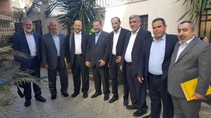 9 Saleh al-arouri (fourth from left), deputy head of Hamas' political bureau, with the Hamas delegation he headed that went to Cairo for talks with Egyptian General Intelligence.