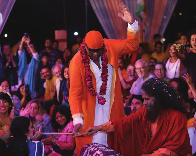 3 4 5 6 Pujya Swamiji plays with renowned percussionist Sivamani during International Yoga Festival 2 1 31