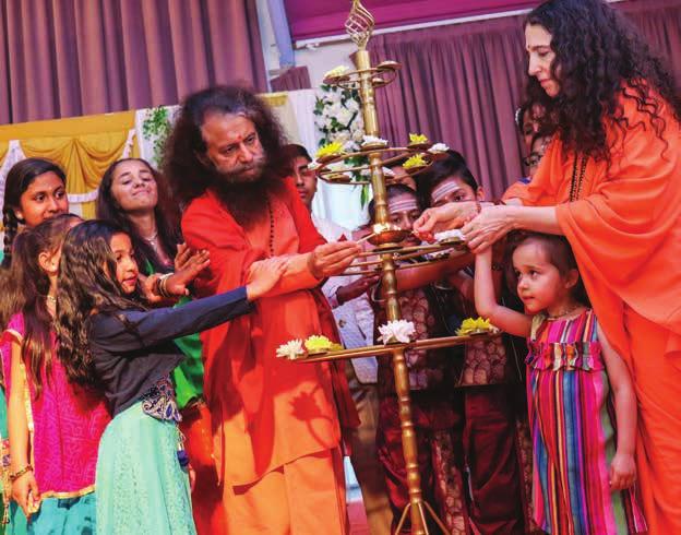 30 1 2 3 4 5 Pujya Swamiji and Sadhvi Bhagawatiji light the inaugural lamp with children during beautiful spiritual program at Shree Sanatan Mandir, Leicester, UK 29 Navratri Begins eptember ctober