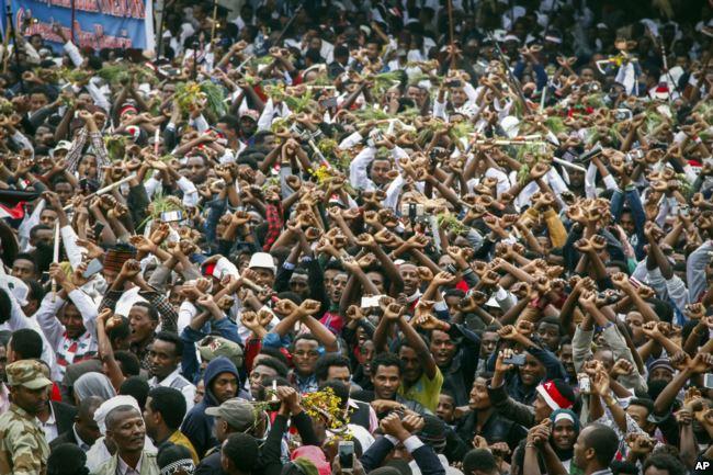 FILE Protesters chant slogans against the government during a march in Bishoftu, in the Oromia region of Ethiopia, Oct.