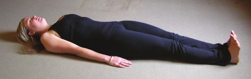 Tibetan No. 2 Lie on your back on a mat. Your legs are fully extended, ankles flexed and touching. Arms are by your side with the palms flat on the floor.
