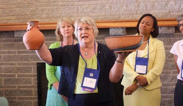 Retired Bishop Charlene Kammerer presented a visible reminder of that progress a mended bowl and pitcher.