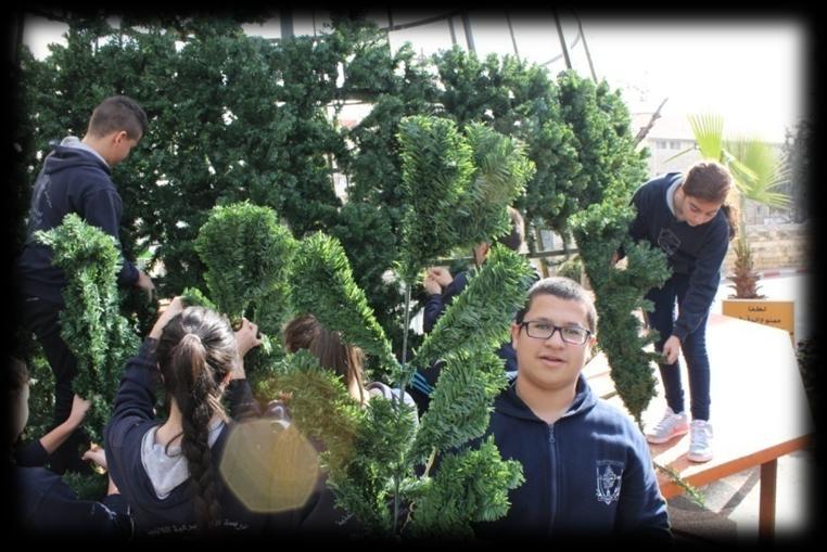 23 P a g e Participation in assembling the Christmas tree LPS students in Beit Jala, in cooperation with the