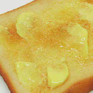 TOAST AND BUTTER Or it might be a biscuit or an apple. The point is, it is at once so satisfying, so simple and so reliable. Everything fades away as we bite through it.