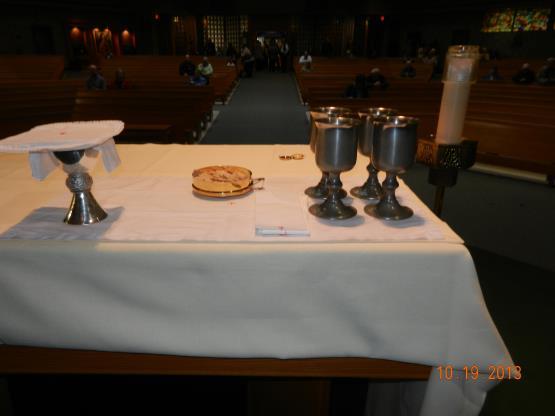 Candle Bearer B - carry one of the candles to and from the Ambo (Podium) - walk with the candle before the Gospel, stand at the Ambo during the Gospel, place in  -