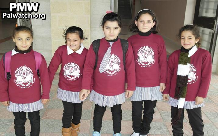 The school uniform in the original Dalal Mughrabi school that was now changed to The Belgian School featured the school logo including a picture of the terrorist: School uniform with the school logo