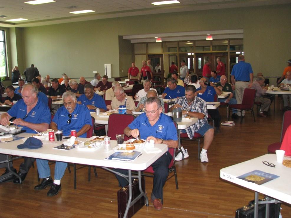Members of Host Council 16433, Waveland enjoy the meal prepared by their Knights while waiting for the SOC to begin.