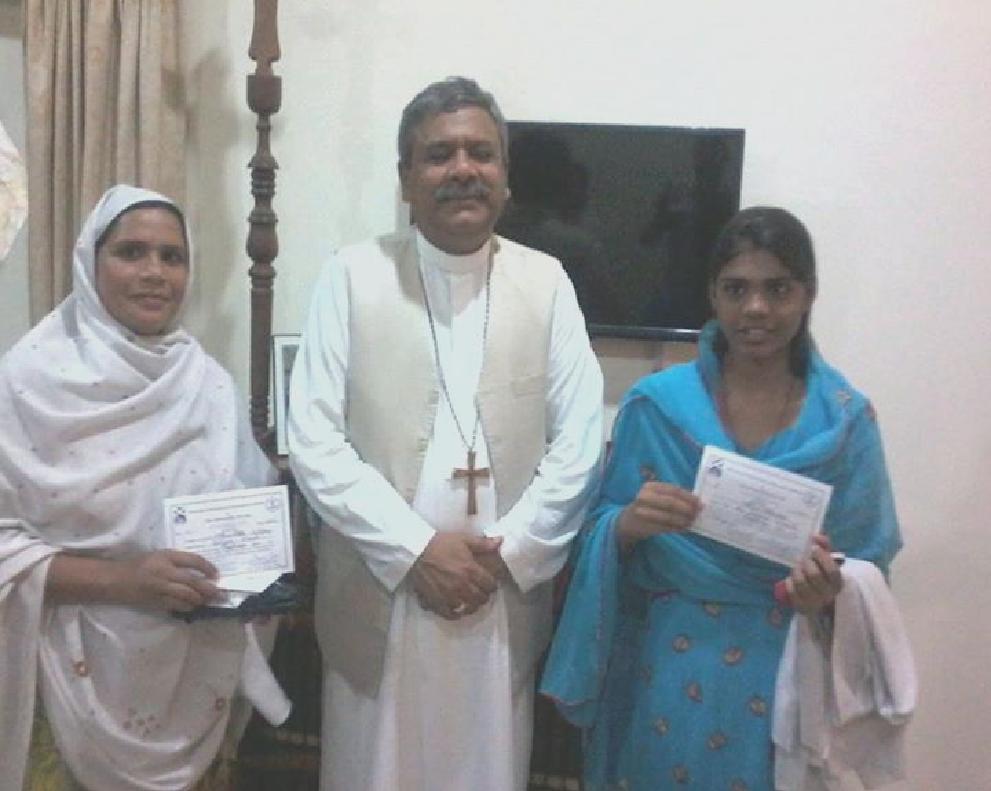 Ceremonies Development & Relief Sector Bishop Humphrey with successful candidates Revd.