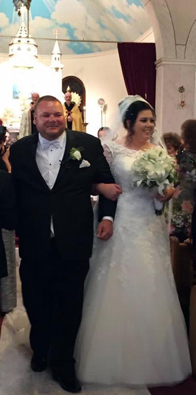 James Clark and Kristen Gallogy exchanged the vows of Holy Matrimony in Sts.