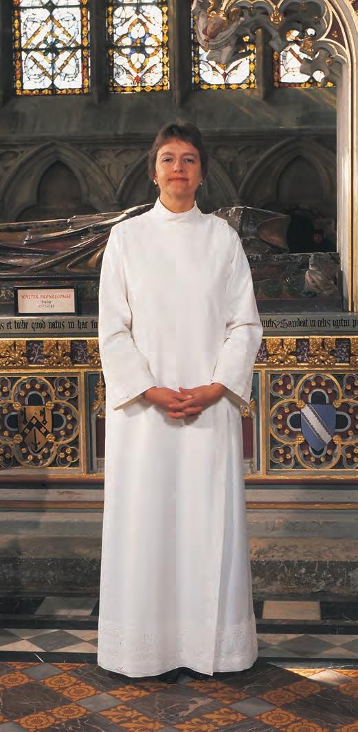 W400 Based on the classic 386 style, this cassock alb is enhanced with the addition of 6" wide I.H.S. lace.