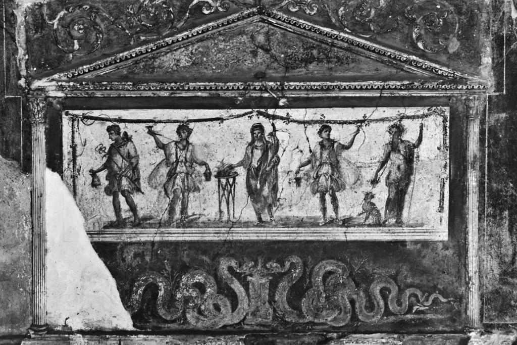 Part B Religion and Belief Source A shows a lararium (family shrine). Source B is from an ancient Roman writer.